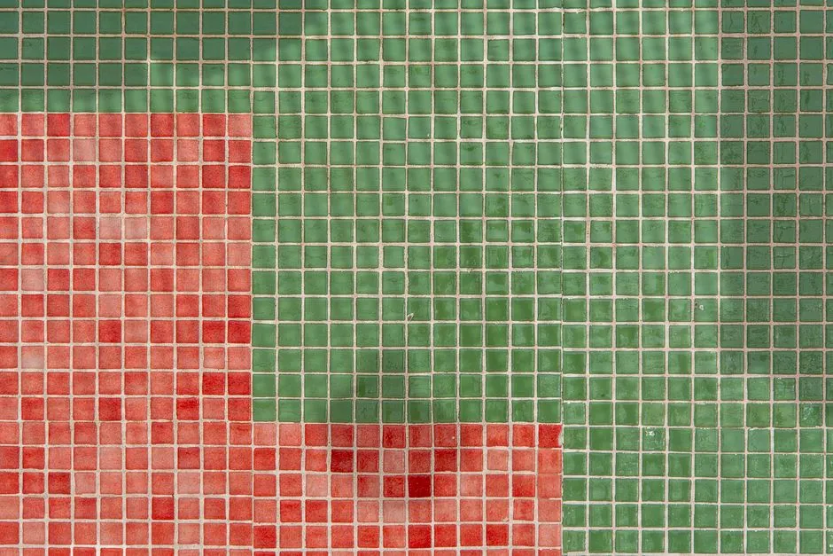 Grid of pale tiles on a tablet with three tiles lit in a recall pattern